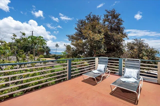 a outdoor space with wooden benches