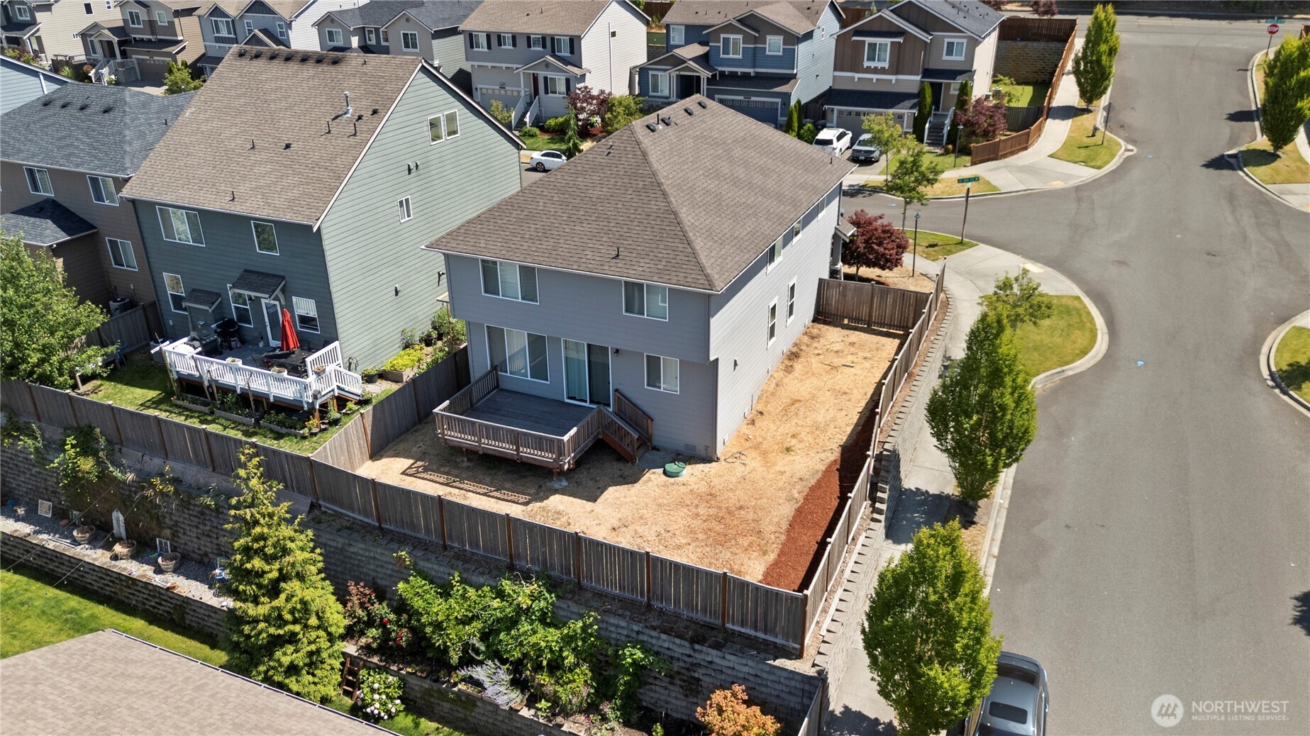 5020 51st Ave Court West University Place, WA 98467 - Photo 20 of 24 an aerial view of a house with swimming pool