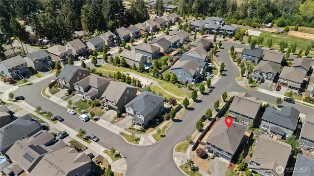 an aerial view of a city with lots of residential buildings