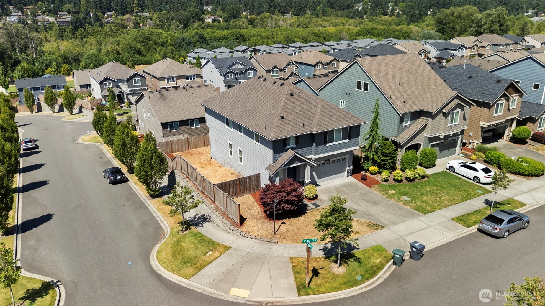 5020 51st Ave Court West University Place, WA 98467 - Photo 23 of 24 an aerial view of a house with a yard basket ball court and outdoor seating
