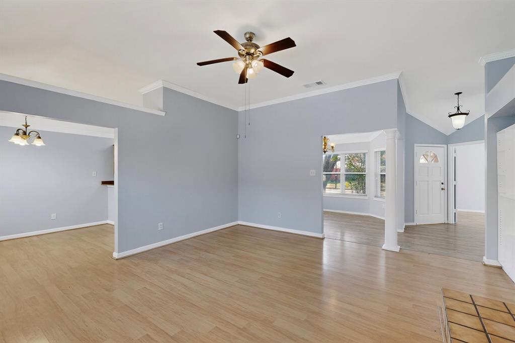 664 Phillips Drive Coppell, TX 75019 - Photo 12 of 24 wooden floor in an empty room with a window