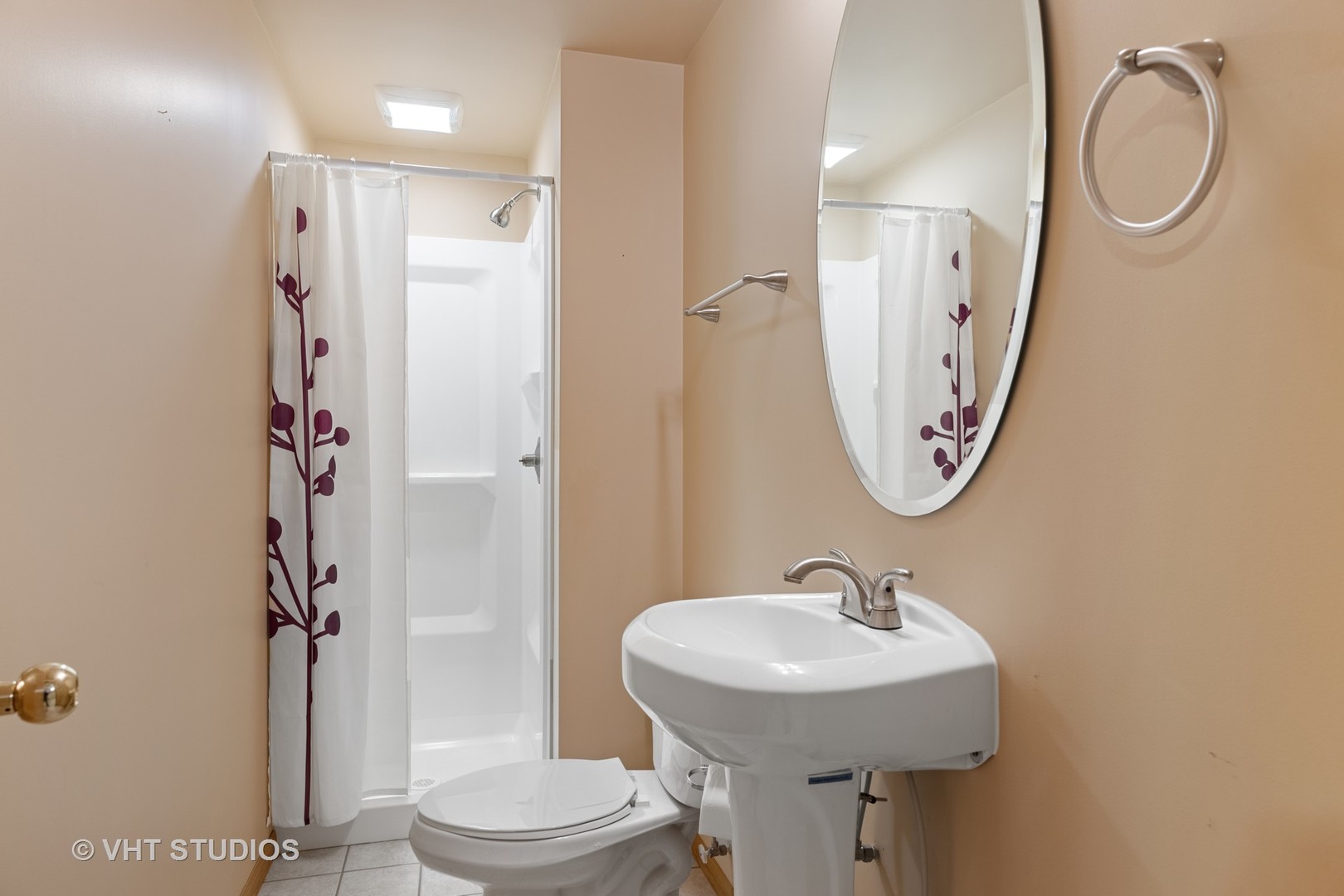 5201 Brighton Lane Plainfield, IL 60586 - Photo 15 of 18 a bathroom with a sink toilet and a mirror