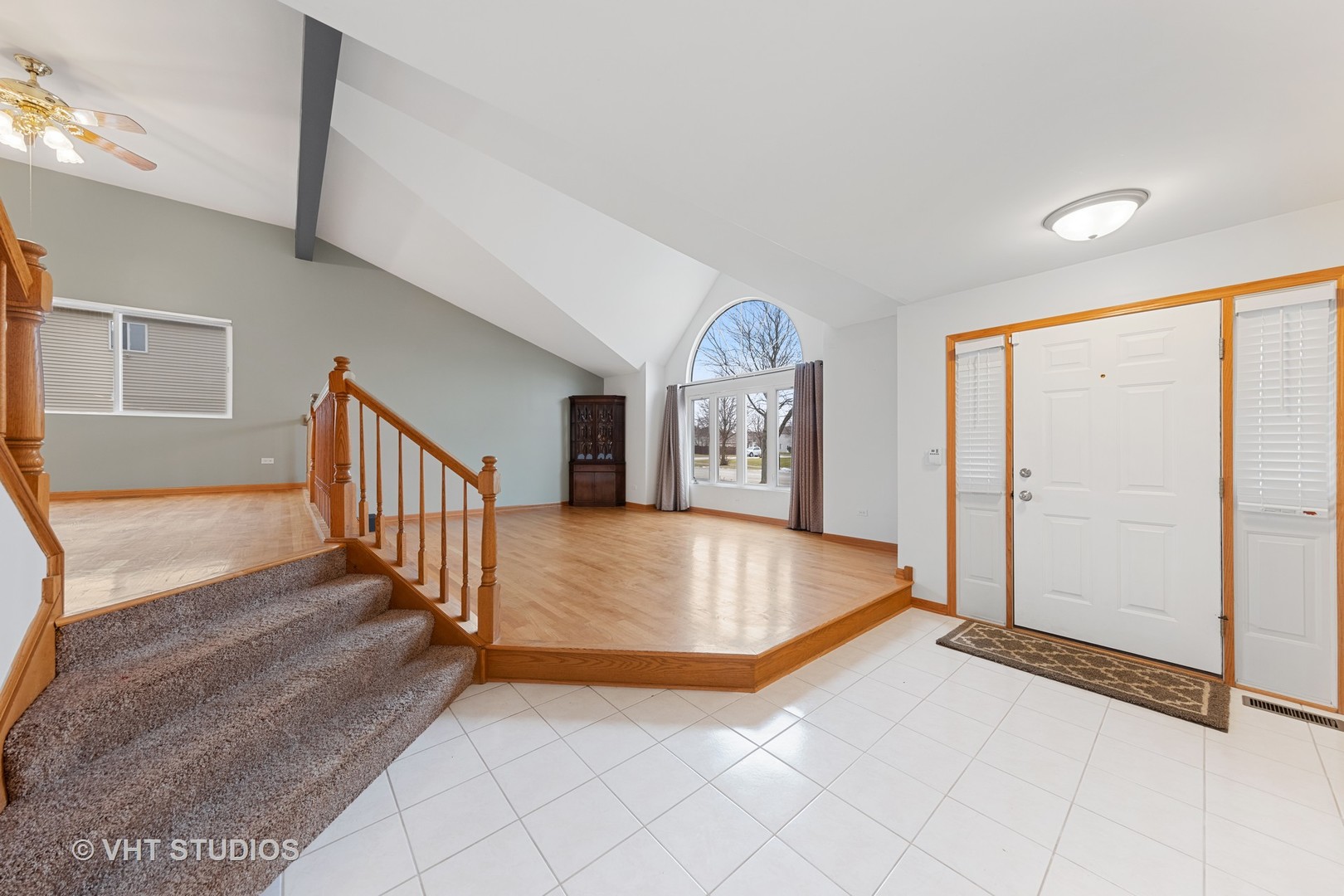 5201 Brighton Lane Plainfield, IL 60586 - Photo 2 of 18 an entryway with staircase