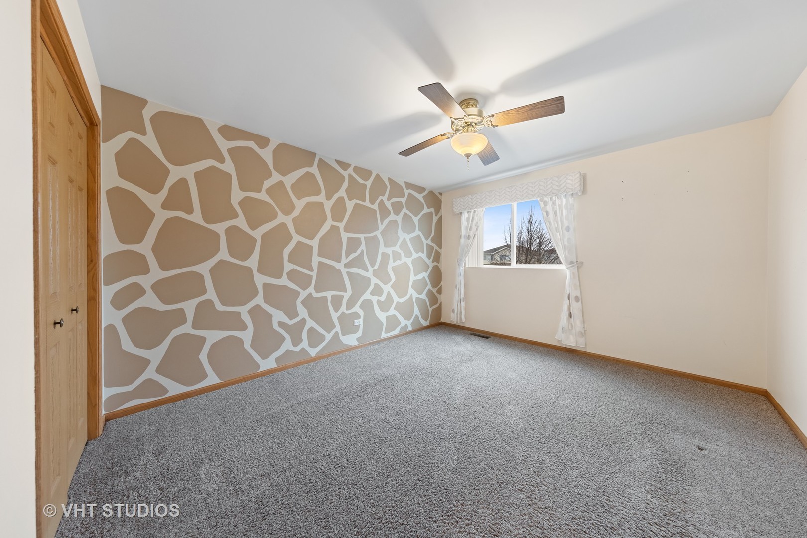 5201 Brighton Lane Plainfield, IL 60586 - Photo 10 of 18 a view of an empty room with a window