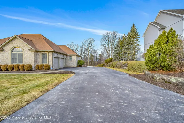 $600,000 | 327 Glenmaura Drive, Moosic, PA 18507