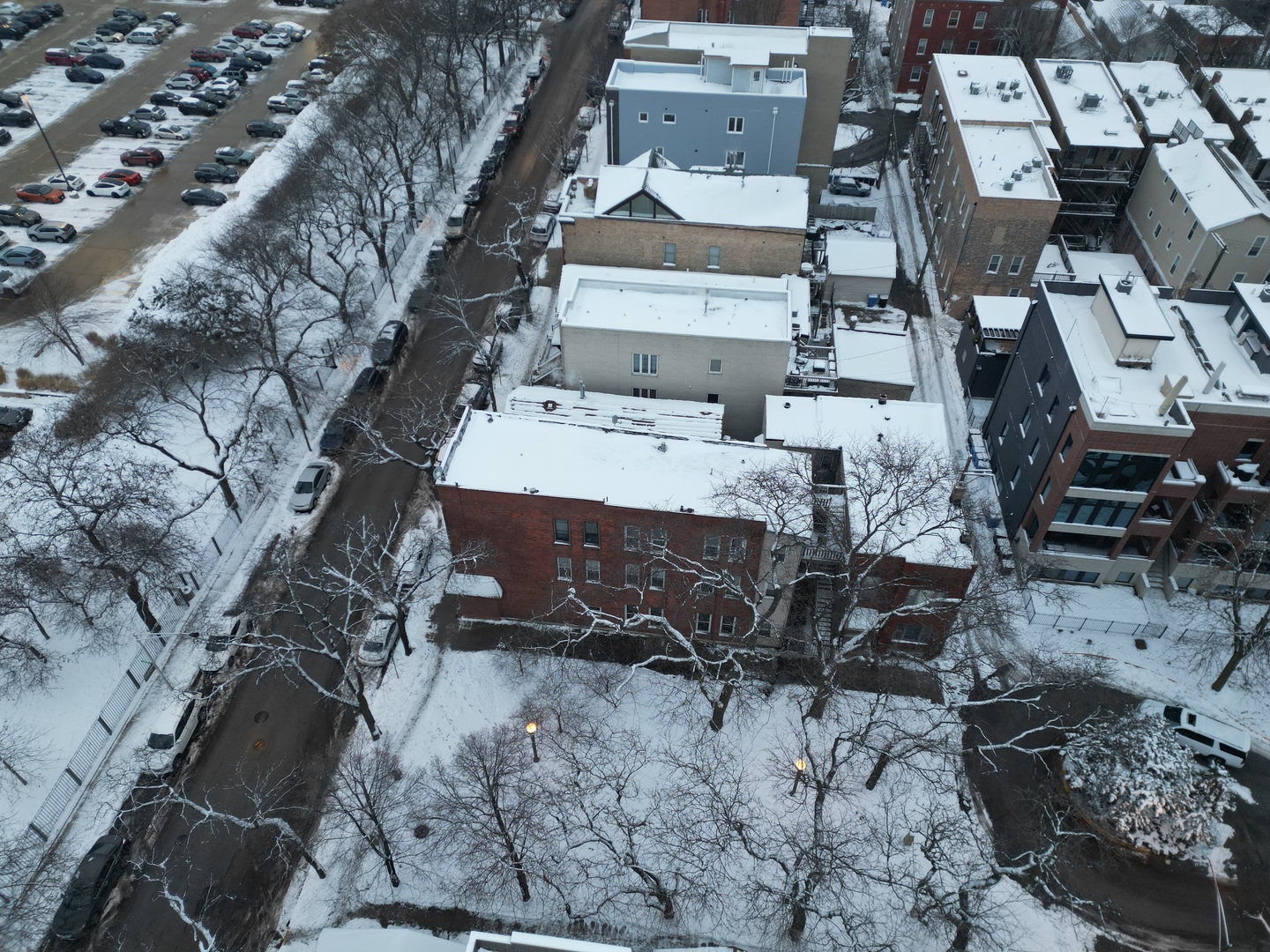 1123 West Vernon Park Place Chicago, IL 60607 - Photo 10 of 27 an aerial view of a house with a yard and sitting area