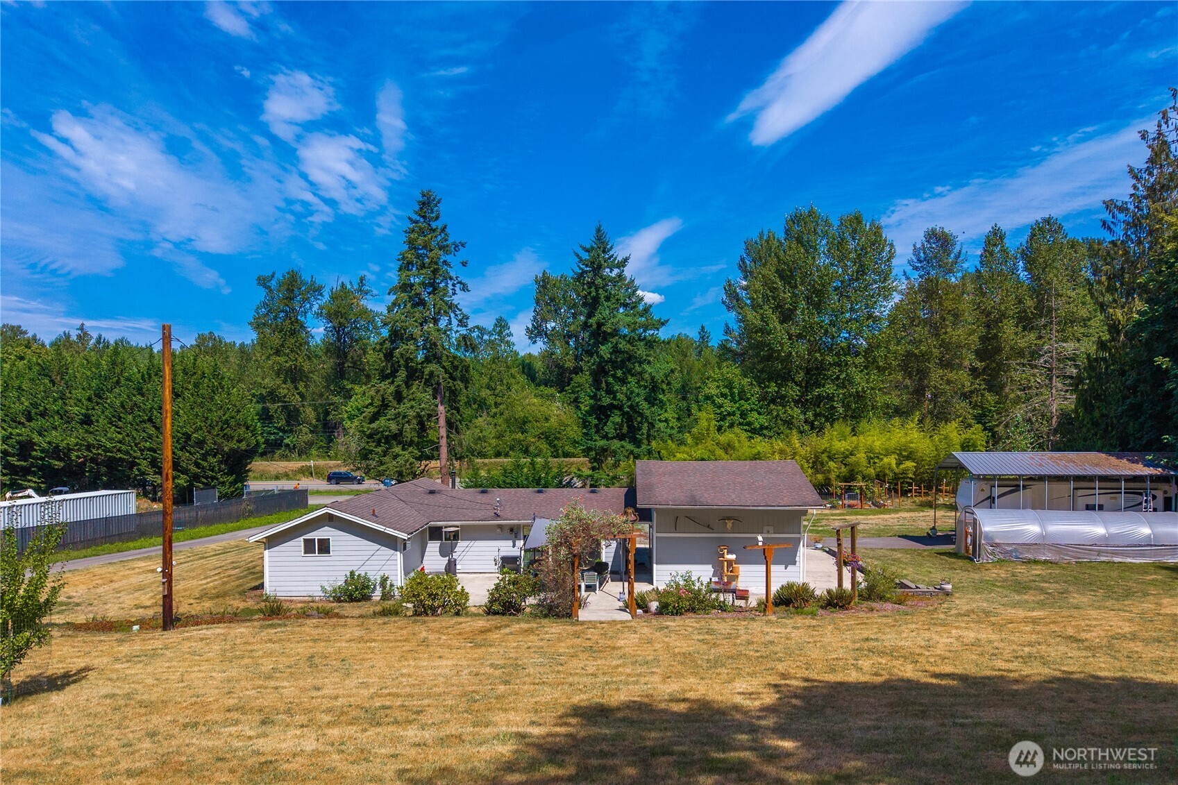 18201 Renton-Maple Valley Road Maple Valley, WA 98038 - Photo 28 of 37 a view of a house with swimming pool