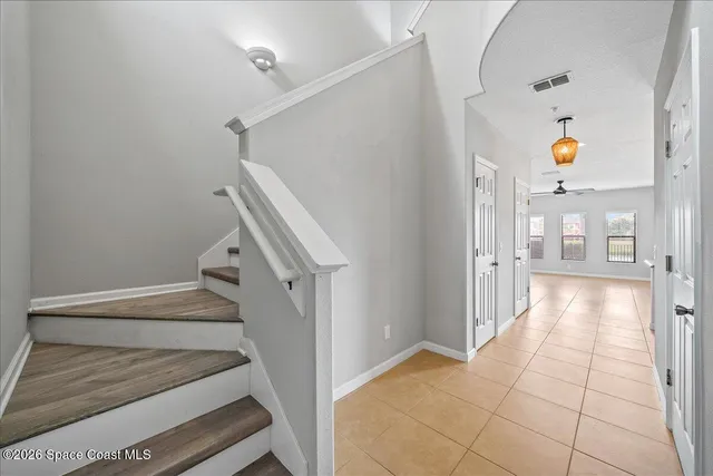 a view of an entryway with staircase