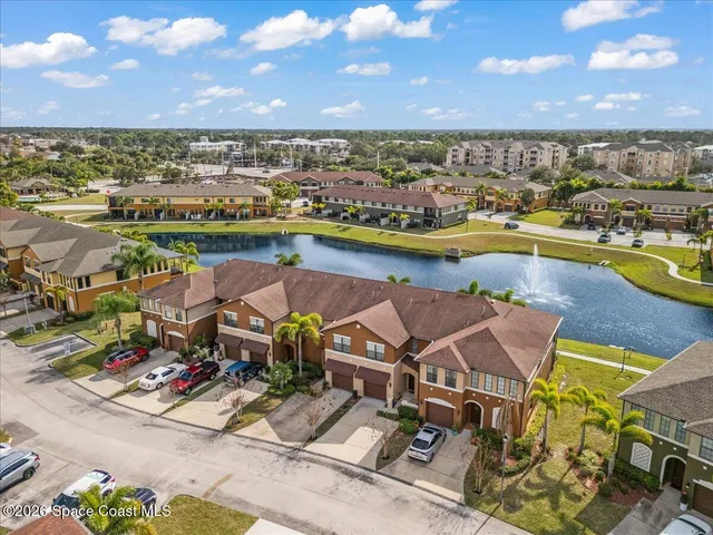 a view of a city with an ocean