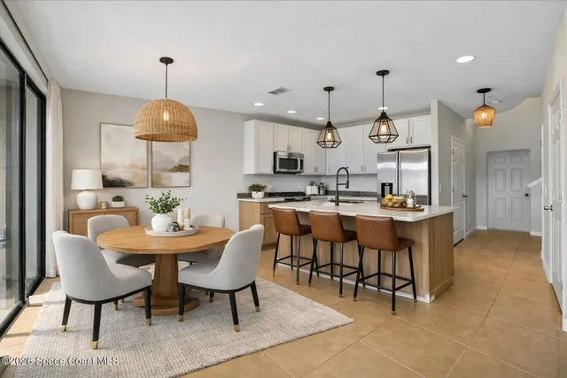 a view of a dining room with furniture