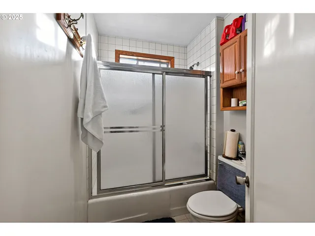 a bathroom with a sink mirror and vanity