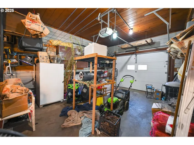 a view of backyard of house with green space