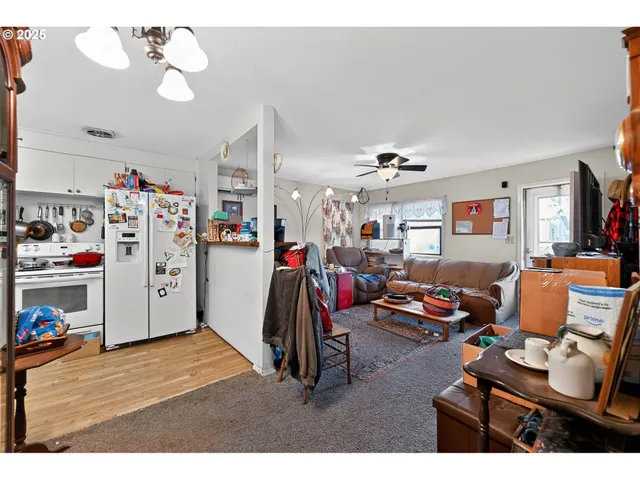 a living room with lots of gym equipment