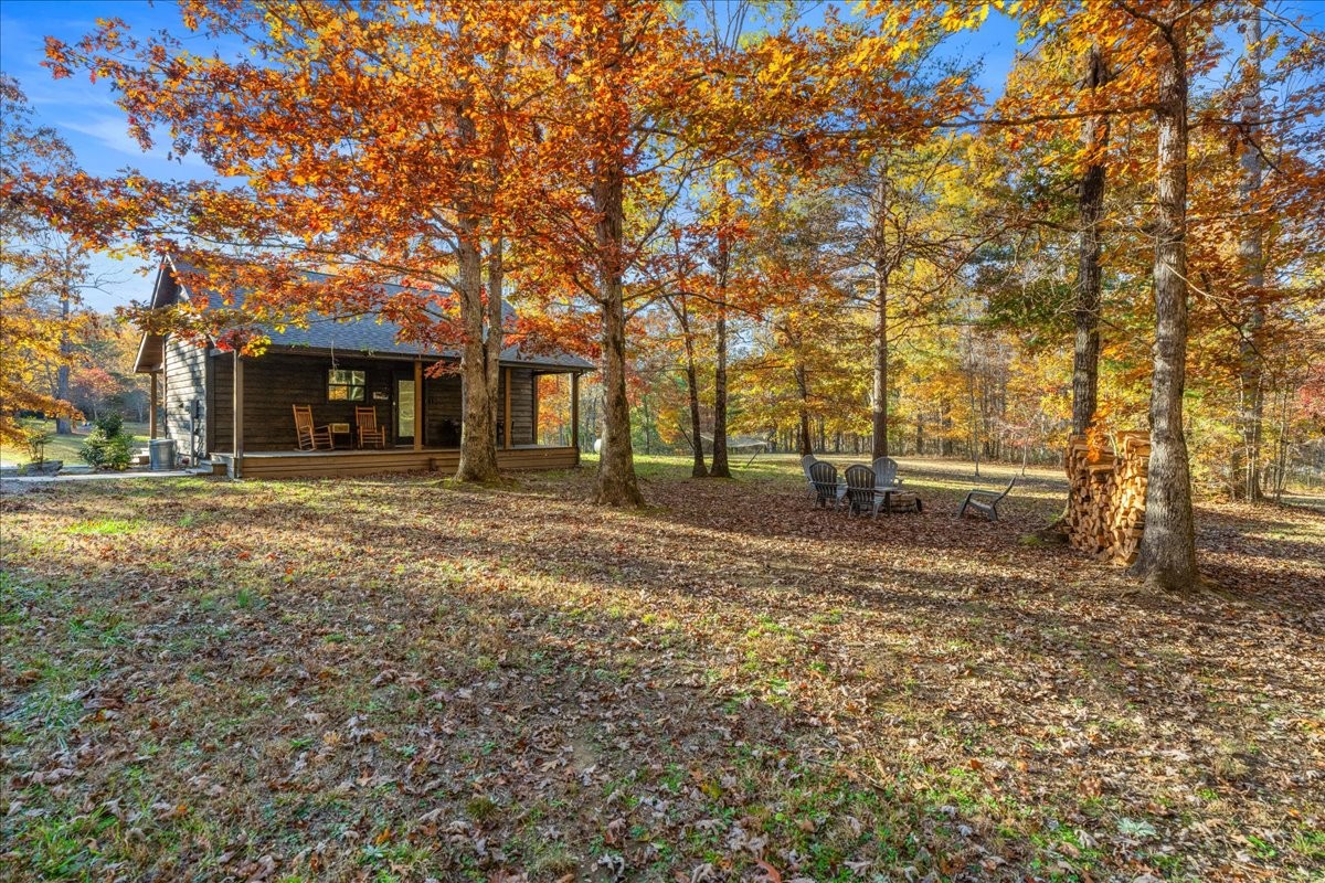 450 Flat Branch Road Tracy City, TN 37387 - Photo 12 of 57 a view of a house with a yard
