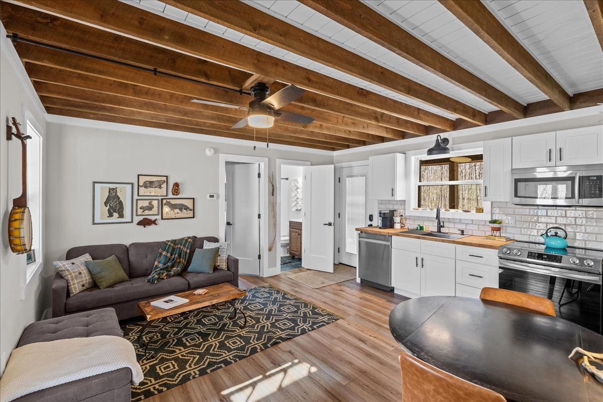 450 Flat Branch Road Tracy City, TN 37387 - Photo 30 of 57 a living room with furniture and kitchen view