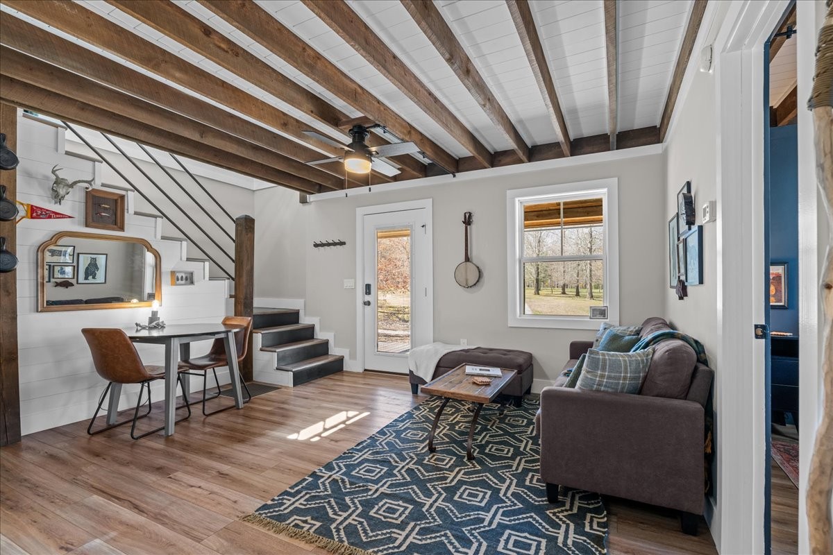 450 Flat Branch Road Tracy City, TN 37387 - Photo 32 of 57 a living room with furniture and a window