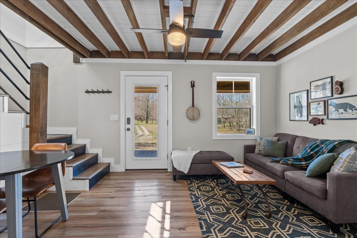 450 Flat Branch Road Tracy City, TN 37387 - Photo 34 of 57 a living room with furniture and wooden floor