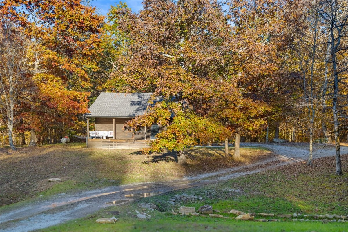 450 Flat Branch Road Tracy City, TN 37387 - Photo 10 of 57 a view of house with outdoor space