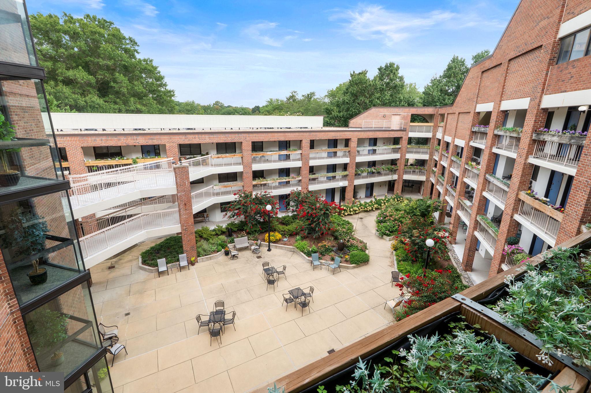 1951 Sagewood Lane, Unit 315 Reston, VA 20191 - Photo 20 of 37 aerial view of a large building