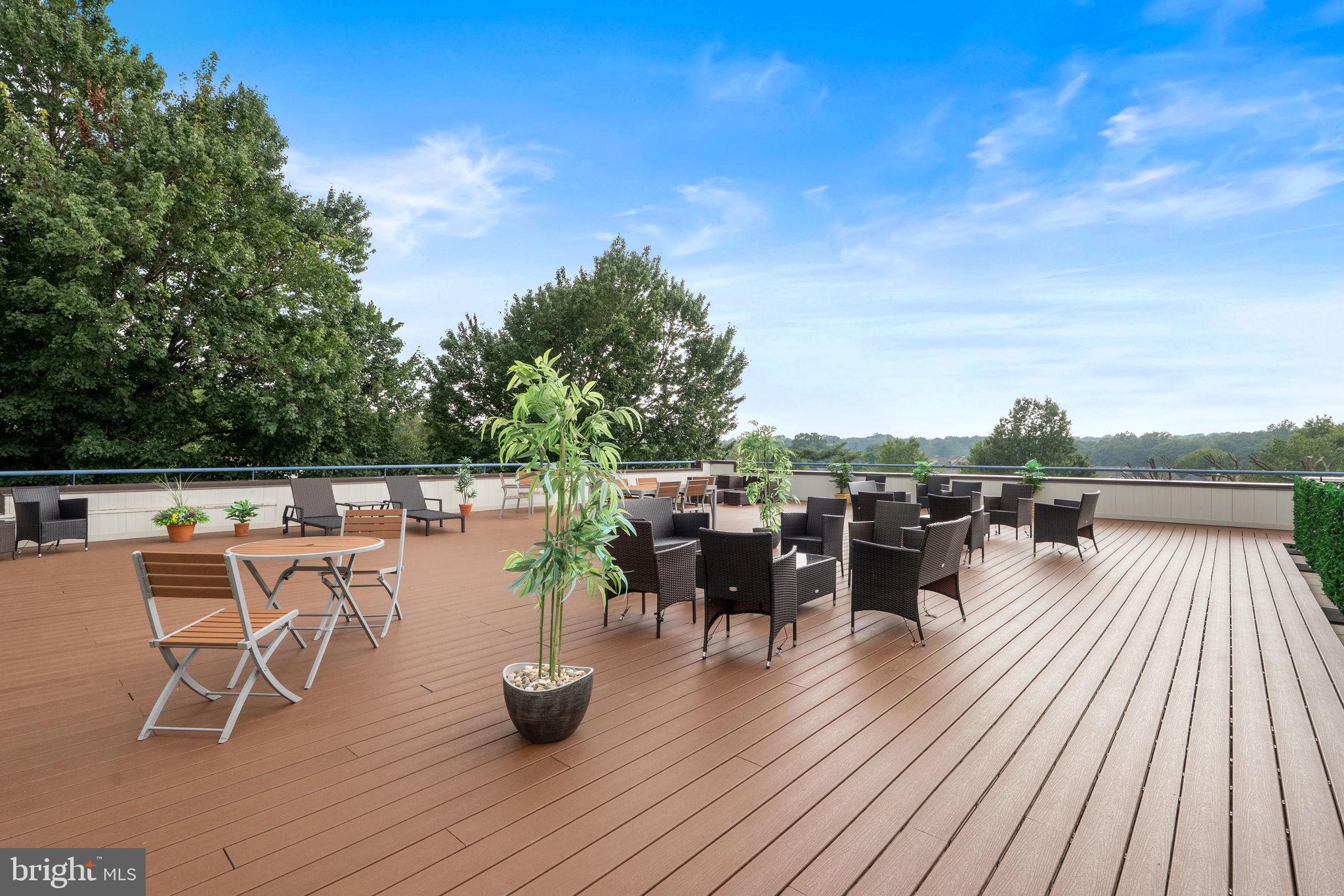 1951 Sagewood Lane, Unit 315 Reston, VA 20191 - Photo 27 of 37 a view of a roof deck and patio