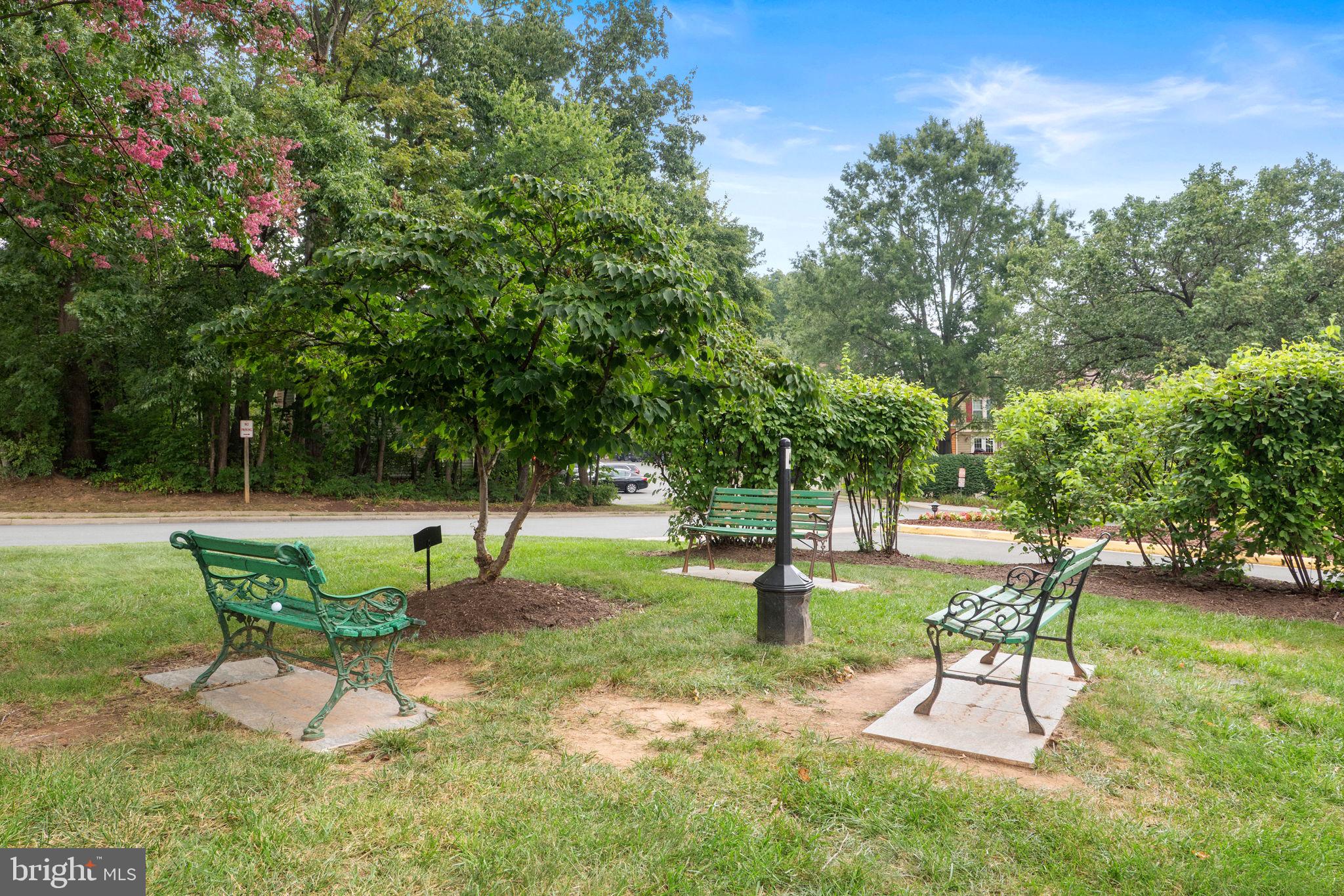 1951 Sagewood Lane, Unit 315 Reston, VA 20191 - Photo 29 of 37 a view of a park with a bench