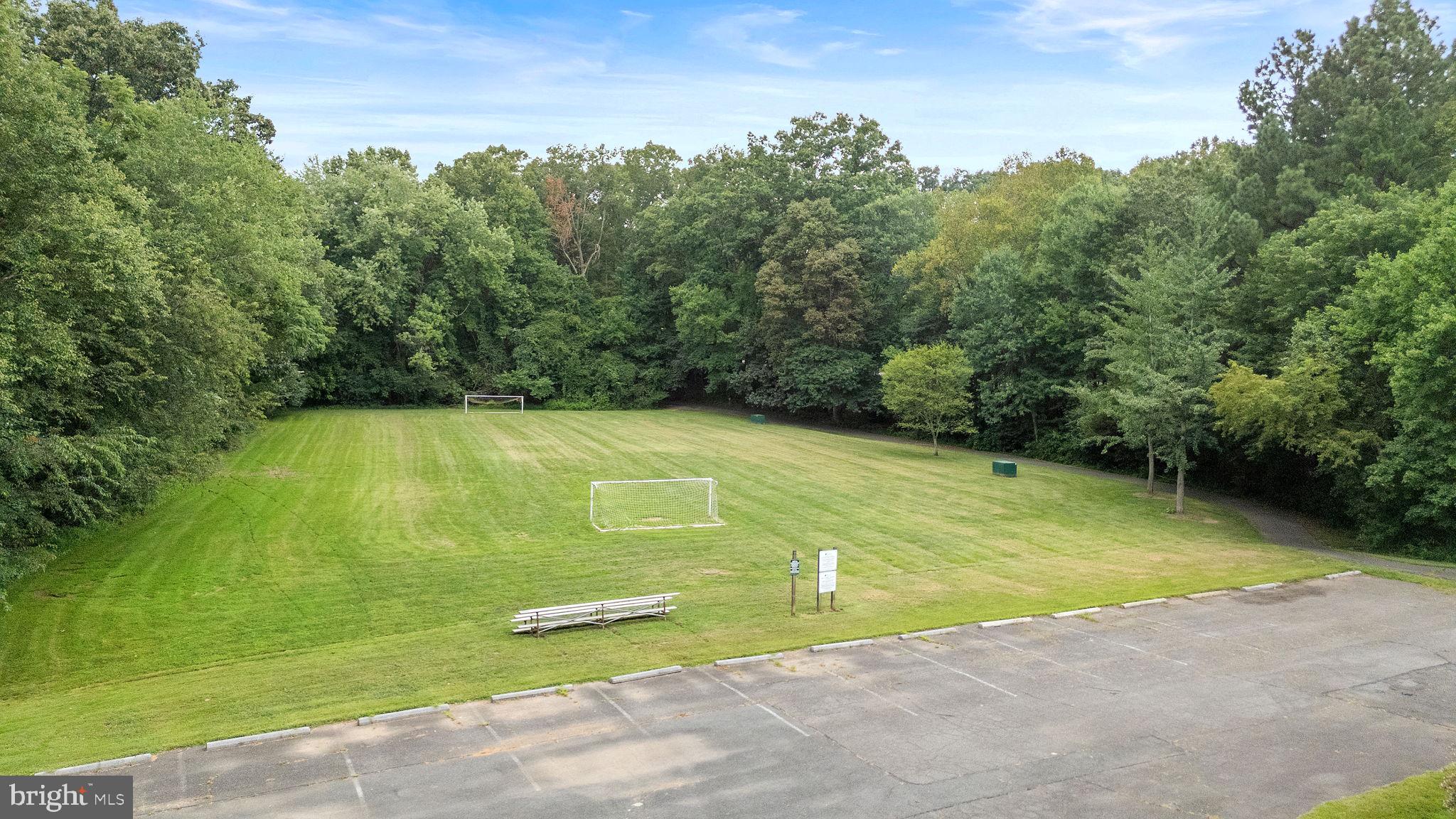 1951 Sagewood Lane, Unit 315 Reston, VA 20191 - Photo 35 of 37 a view of a tennis court