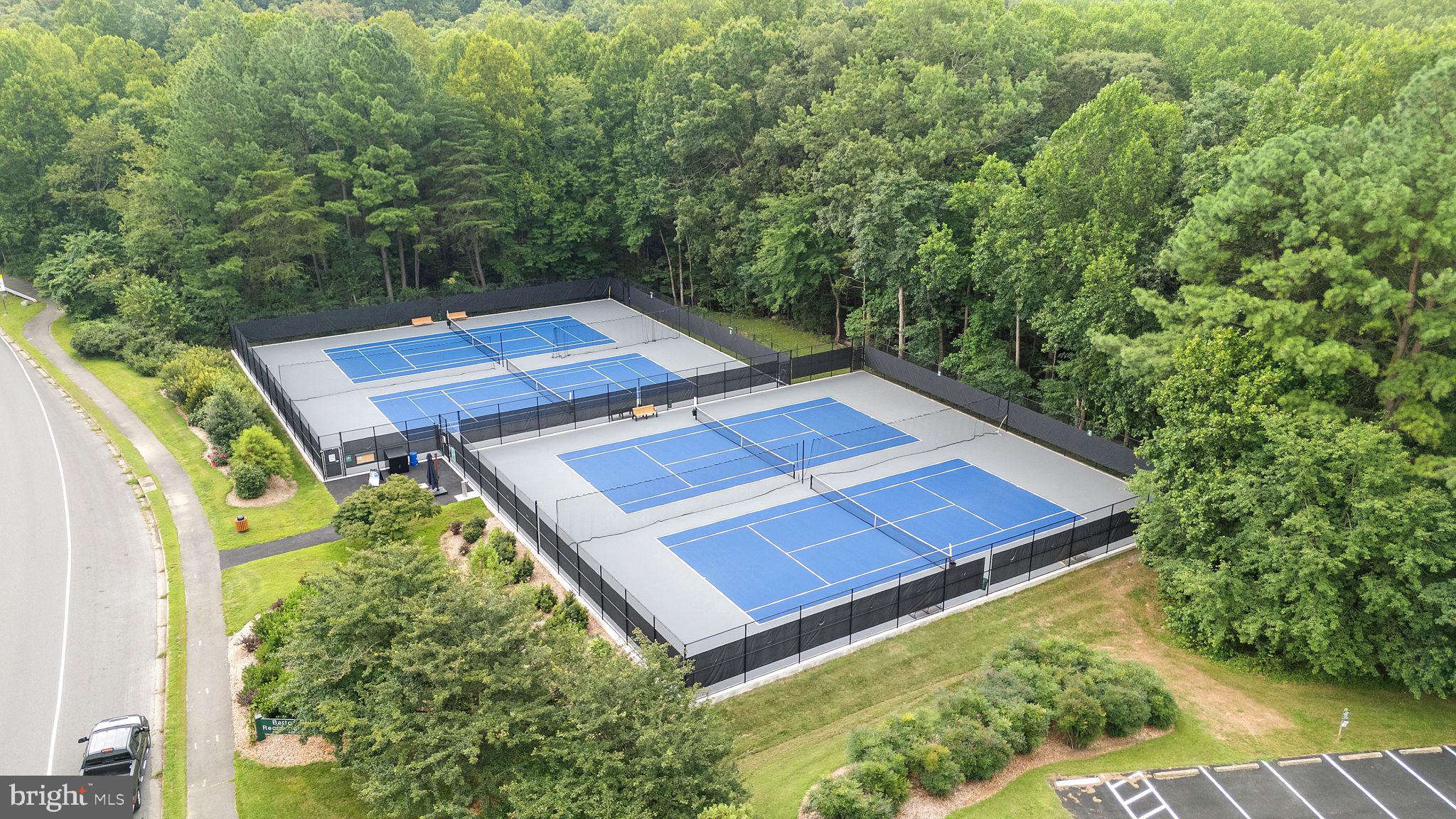 1951 Sagewood Lane, Unit 315 Reston, VA 20191 - Photo 36 of 37 a view of a yard with a house