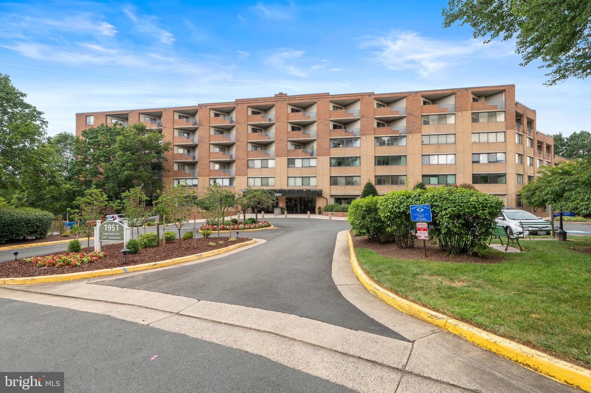 1951 Sagewood Lane, Unit 315 Reston, VA 20191 - Photo 37 of 37 a view of building with yard