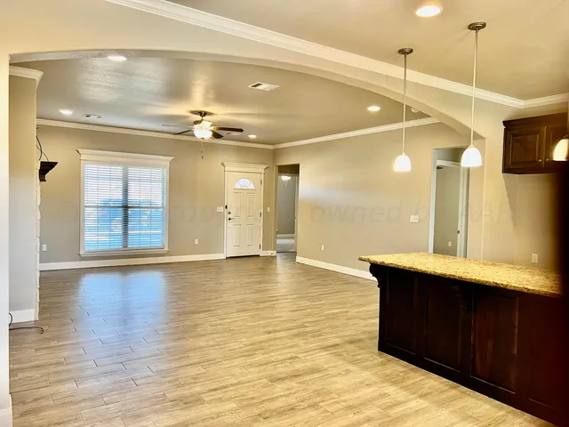 a view of a room with a chandelier