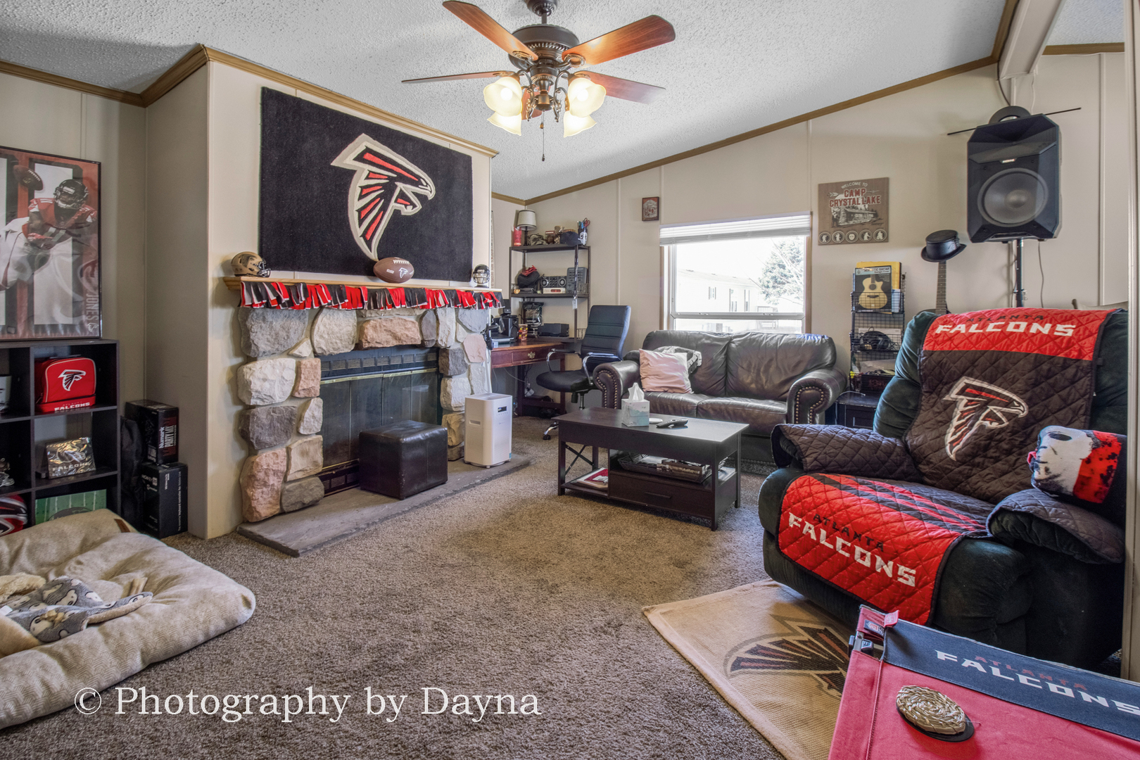 85 St Michaels Drive Bourbonnais, IL 60914 - Photo 10 of 14 a living room with furniture a flat screen tv and a fireplace