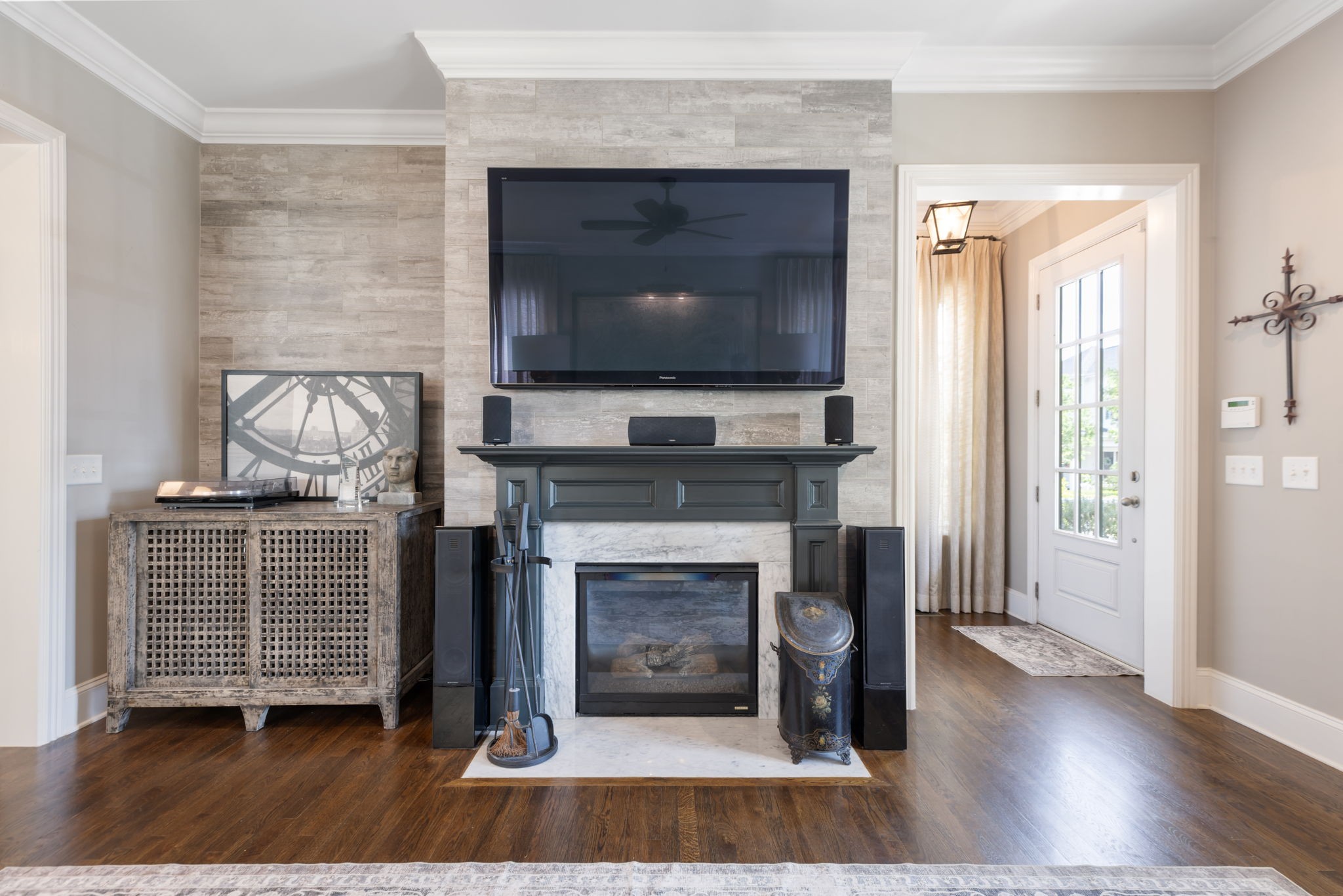 320 Fitzgerald Street Franklin, TN 37064 - Photo 16 of 64 a living room with a fireplace and a flat screen tv