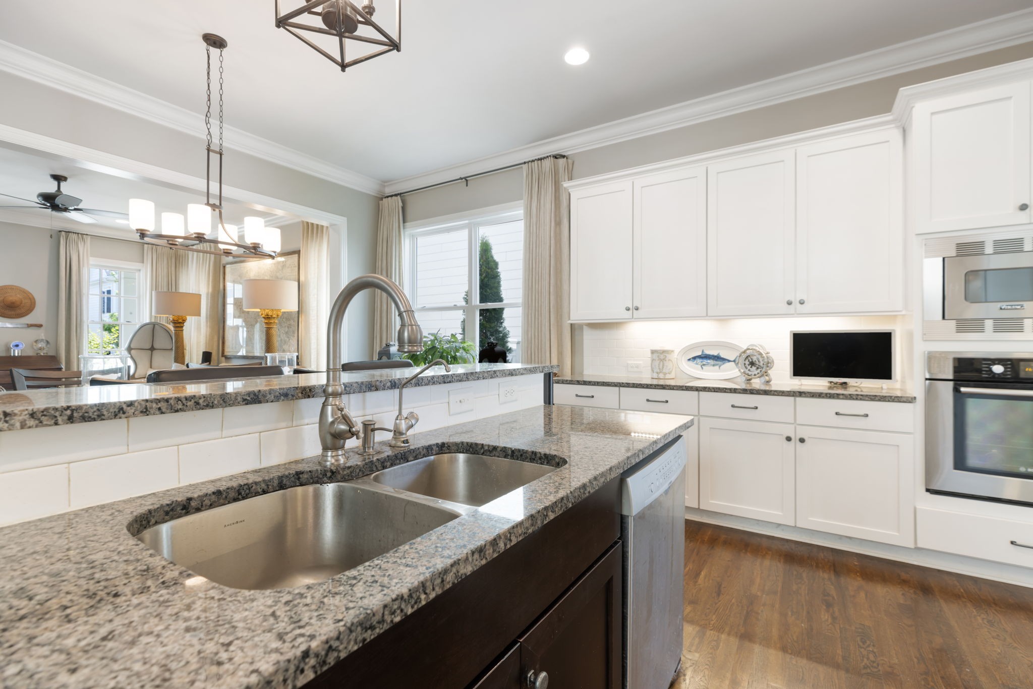 320 Fitzgerald Street Franklin, TN 37064 - Photo 25 of 64 a kitchen with granite countertop a sink a counter top space cabinets and stainless steel appliances