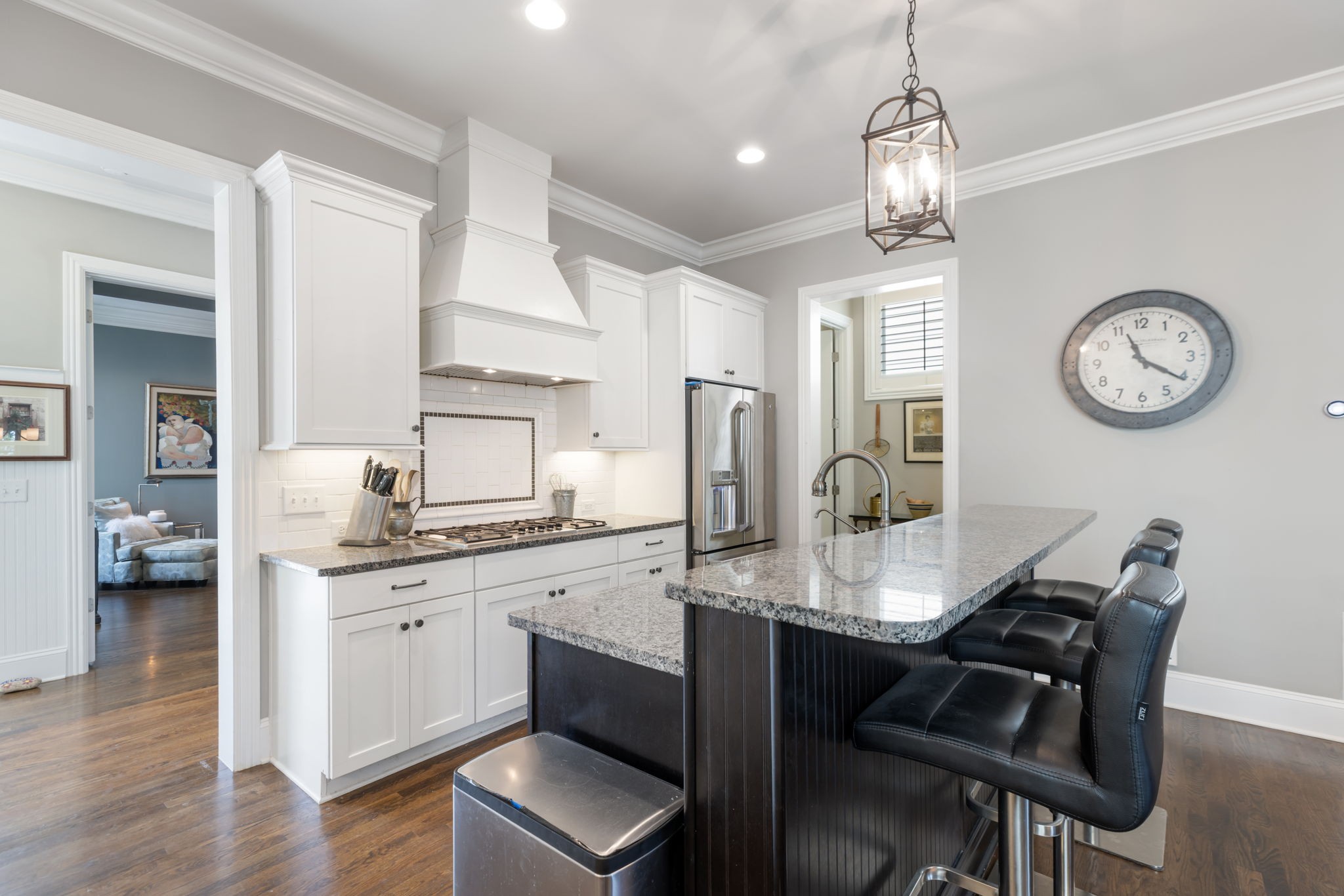 320 Fitzgerald Street Franklin, TN 37064 - Photo 31 of 64 a view of a kitchen area with furniture and wooden floor