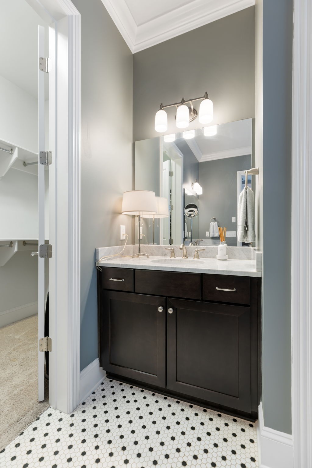 320 Fitzgerald Street Franklin, TN 37064 - Photo 43 of 64 a bathroom with a sink a mirror and a shower