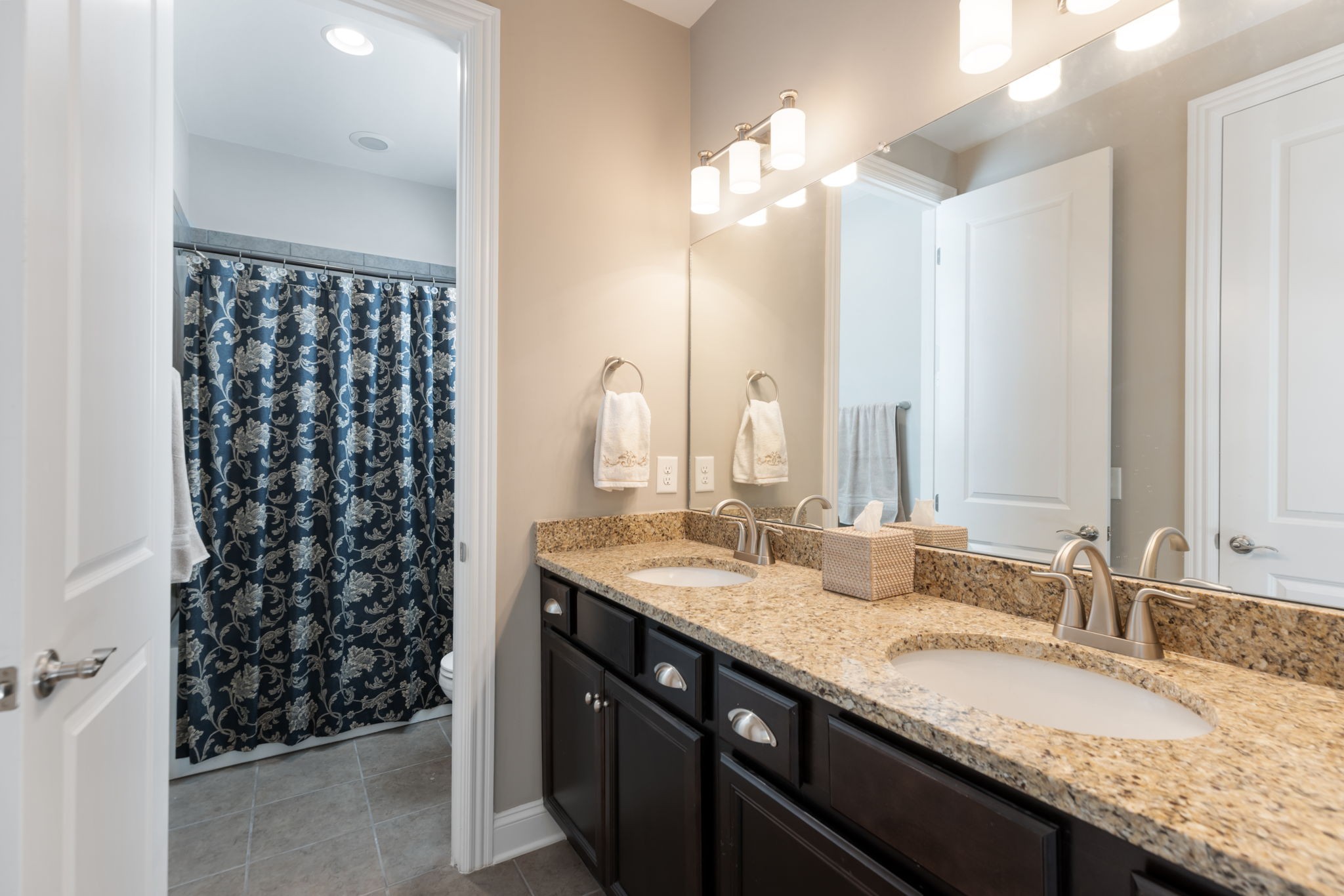 320 Fitzgerald Street Franklin, TN 37064 - Photo 53 of 64 a bathroom with a granite countertop double vanity sink and a mirror