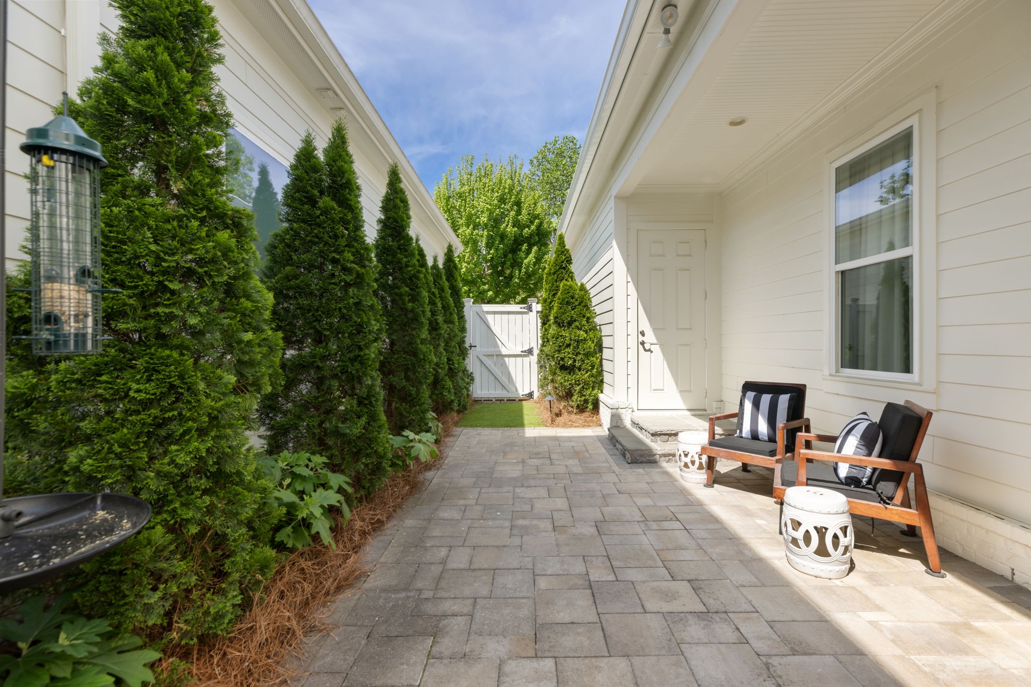 320 Fitzgerald Street Franklin, TN 37064 - Photo 61 of 64 a view of a patio with chairs and potted plants