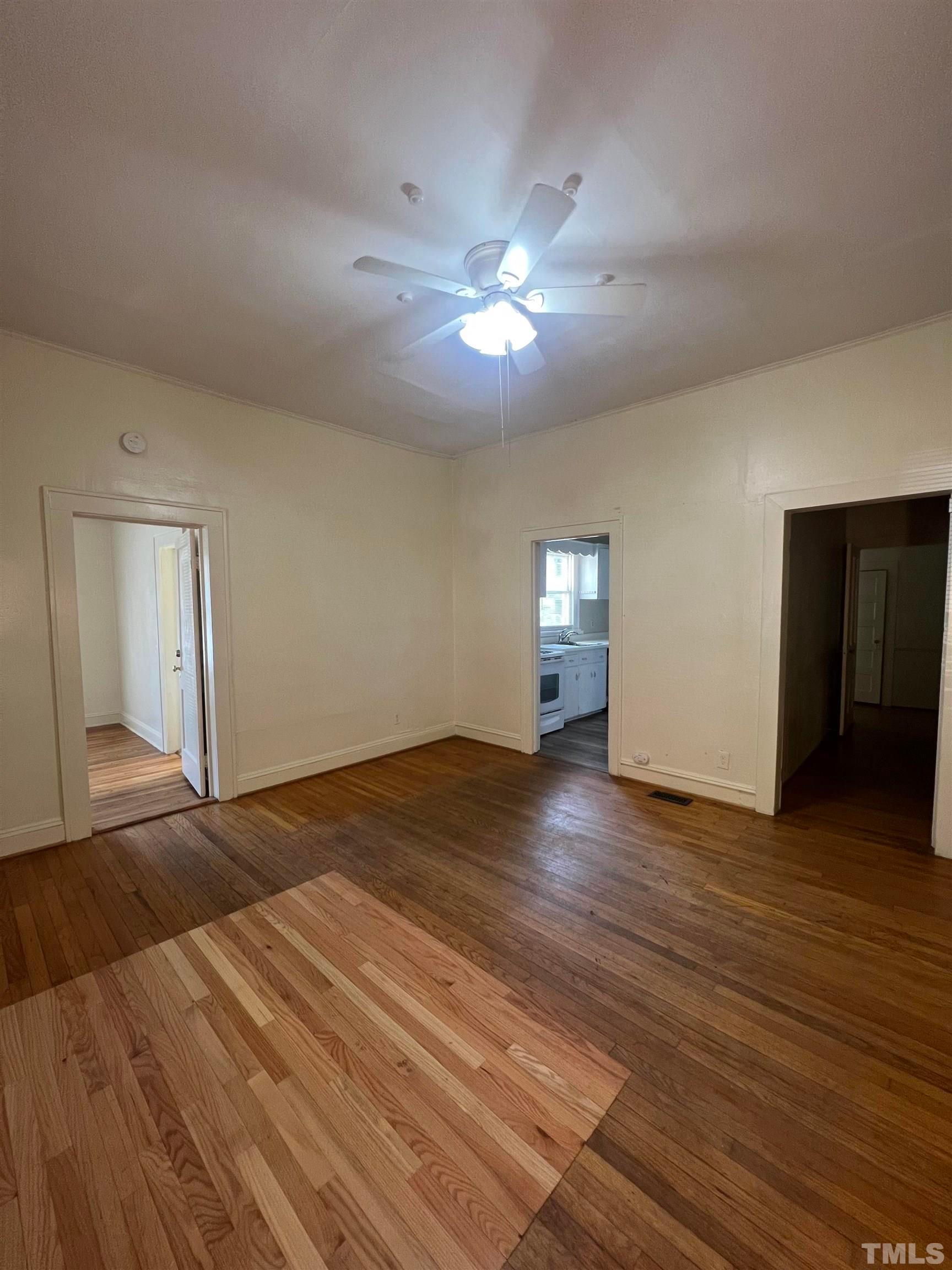 9 Dixie Trail Raleigh, NC 27607 - Photo 2 of 8 a view of empty room with wooden floor