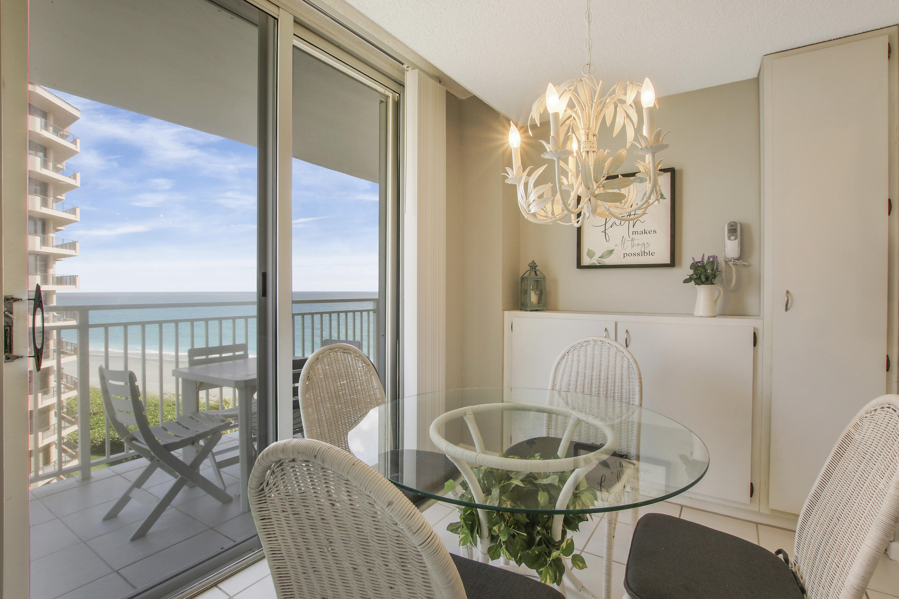 500 Ocean Drive, Unit E9A Juno Beach, FL 33408 - Photo 16 of 21 a living room with furniture and a large window