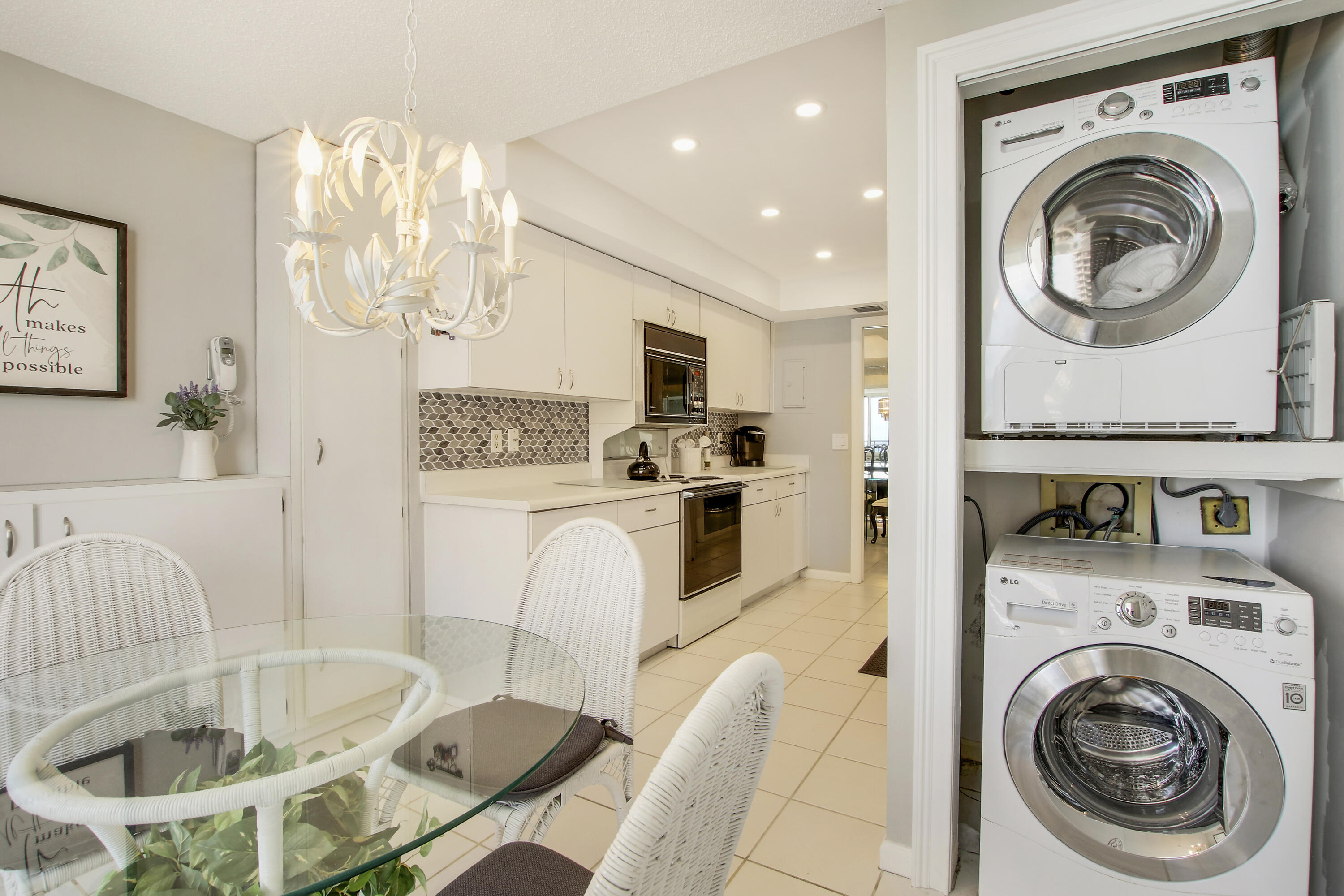 500 Ocean Drive, Unit E9A Juno Beach, FL 33408 - Photo 17 of 21 a view of a kitchen with furniture and wooden floor
