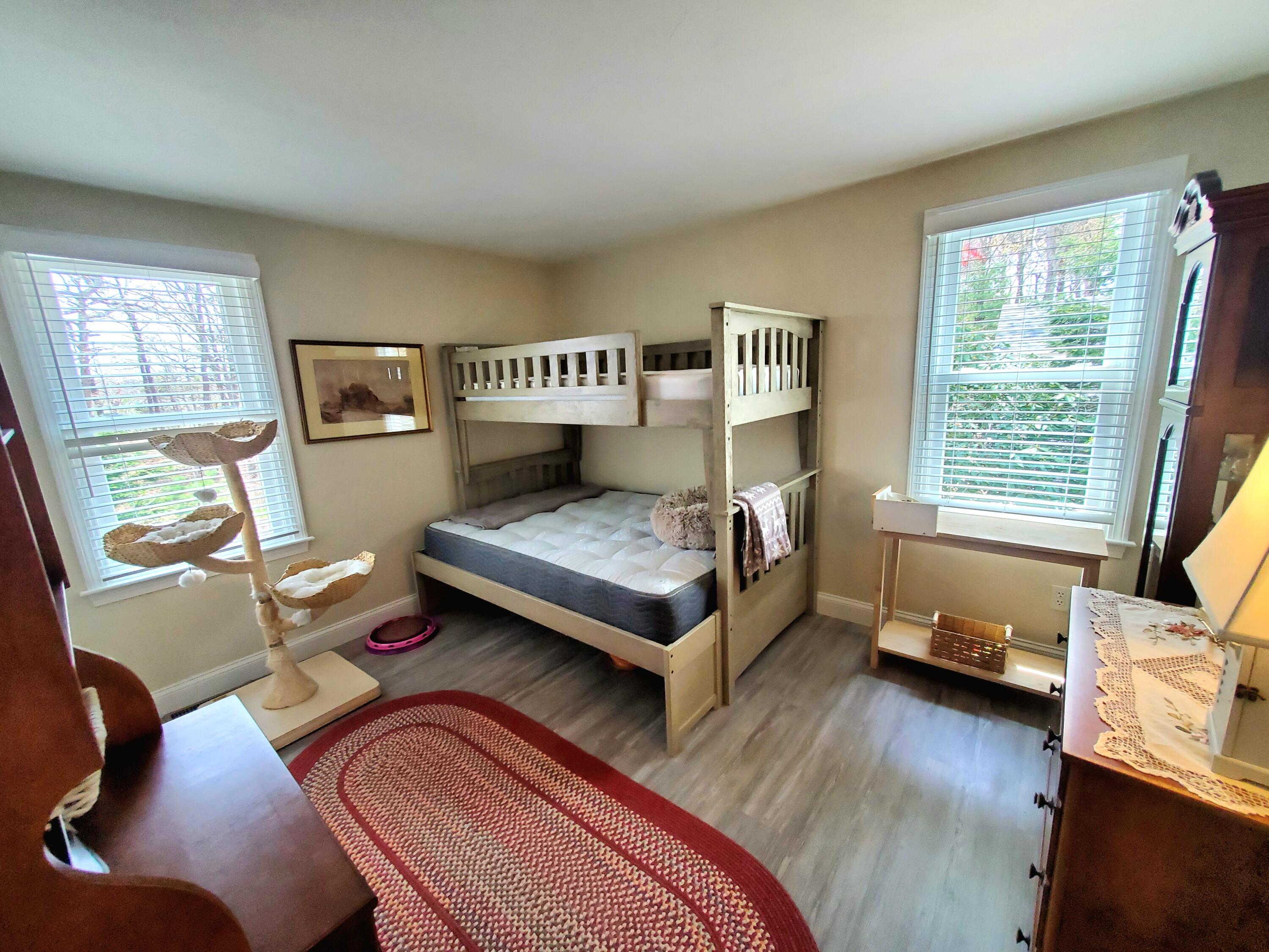 52 Thayer Road Dennis, MA 02660 - Photo 15 of 19 a bedroom with a bed and a window
