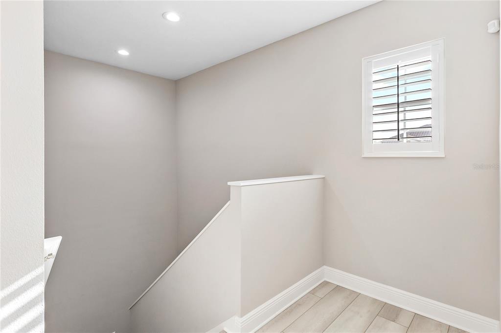 8142 Miramar Way Lakewood Ranch, FL 34202 - Photo 22 of 45 a view of hallway with window