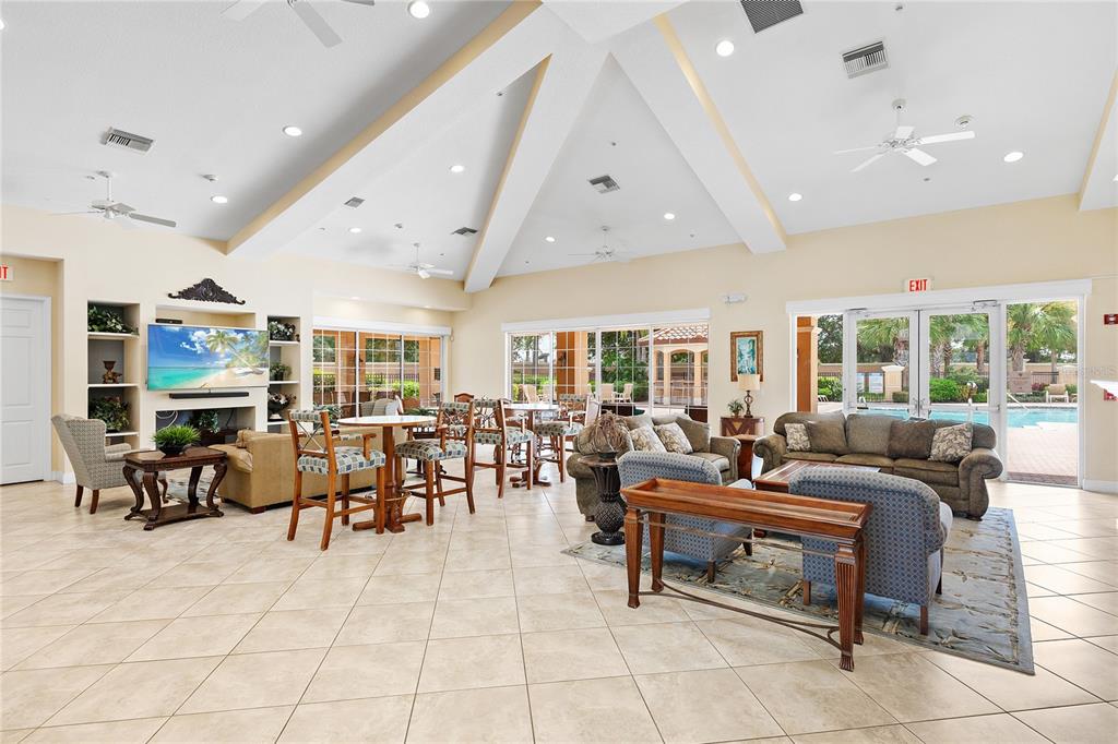 8142 Miramar Way Lakewood Ranch, FL 34202 - Photo 35 of 45 a living room with furniture and a large window