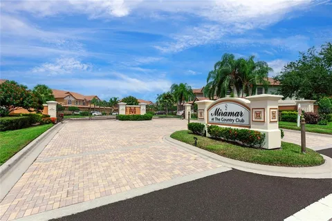 a sign board with street view