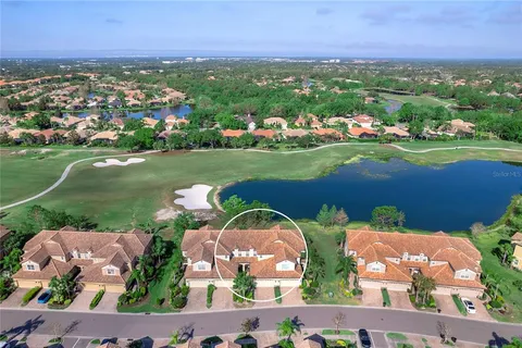 an aerial view of river residential houses with outdoor space and lake view