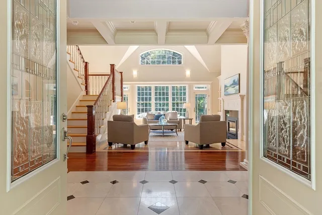 a view of living room with furniture and floor to ceiling window