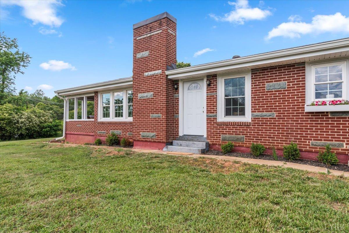 3733 Depot Road Rustburg, VA 24588 - Photo 1 of 58 a view of a house with a yard