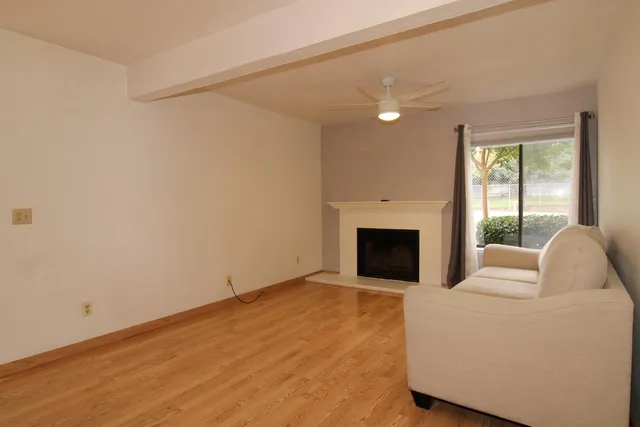 a bedroom with a bed and a fireplace