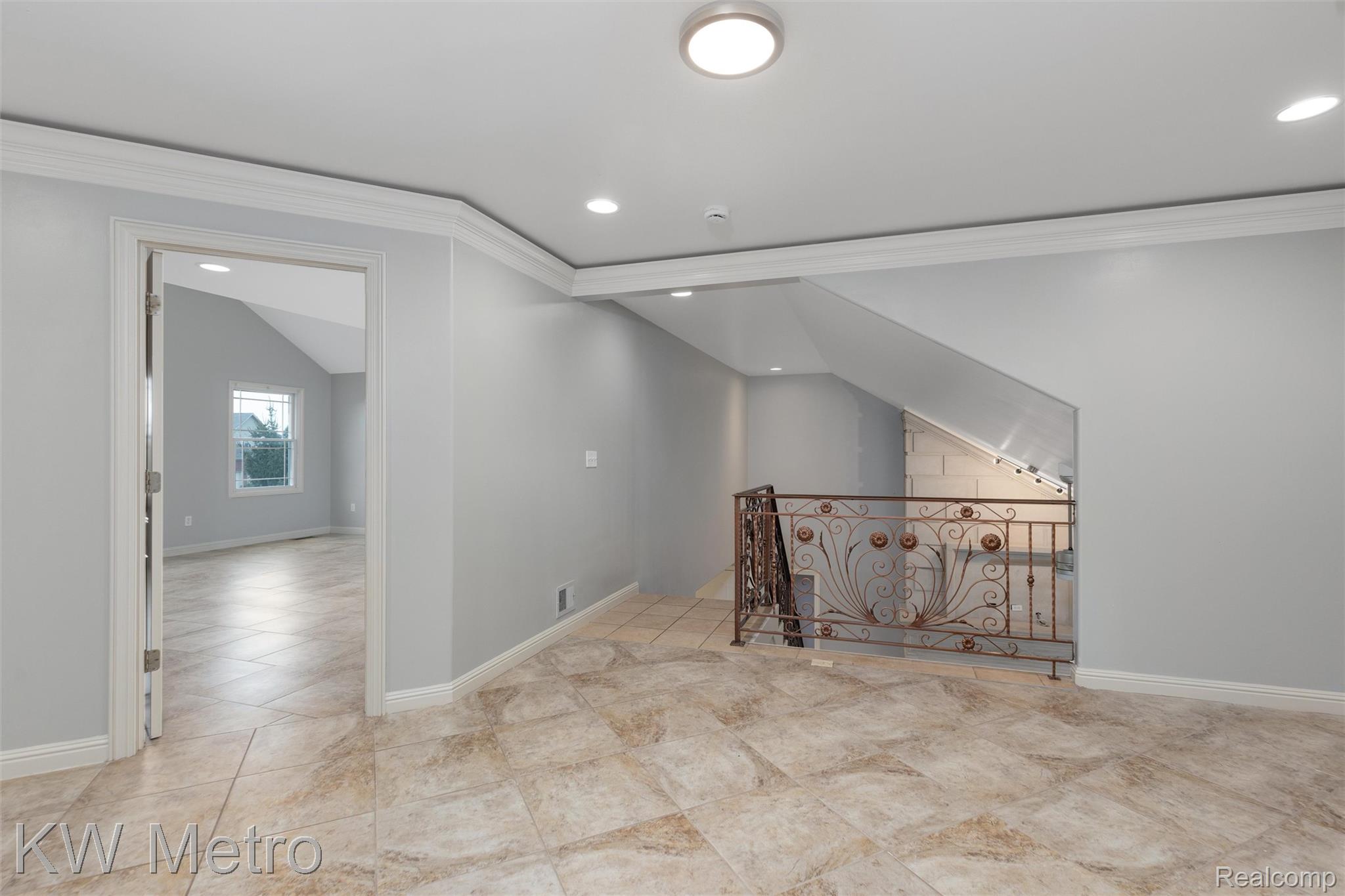65884 Windrose Court Ray, MI 48096 - Photo 68 of 82 2nd floor foyer. Possible game room, additional living space, or work out area