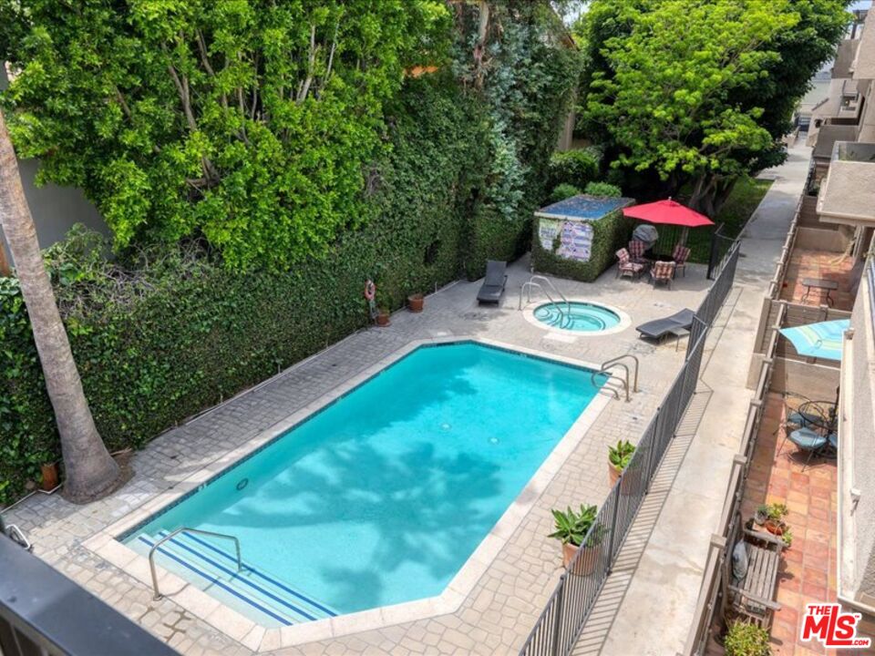 4477 Woodman Avenue, Unit 304 Sherman Oaks, CA 91423 - Photo 30 of 34 a view of yard from deck
