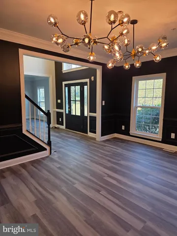 a utility room with sink dryer and washer